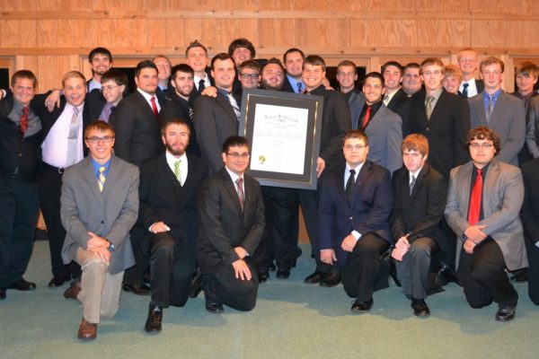 Our chapter receiving its official charter, finally taking us to the next step: Chapter.
